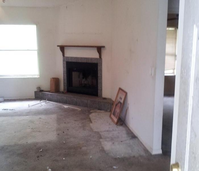 a fireplace with no carpet on the floor