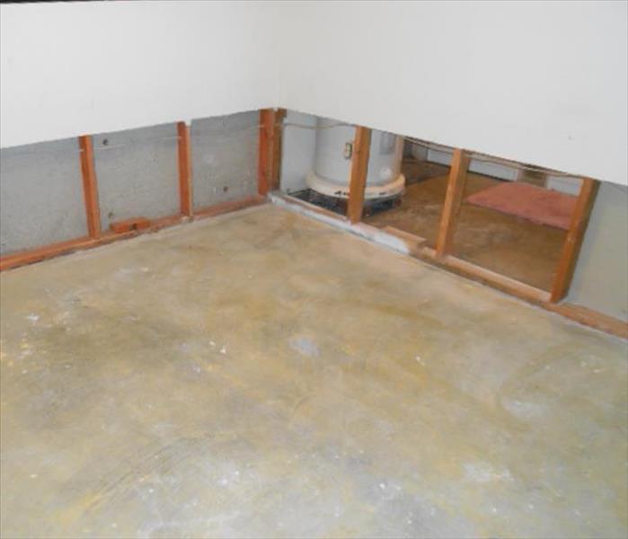 removed carpet from a room with a flood cut