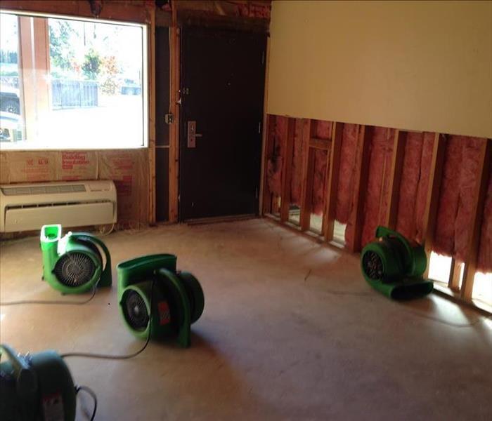 green drying equipment in a home with a flood cut