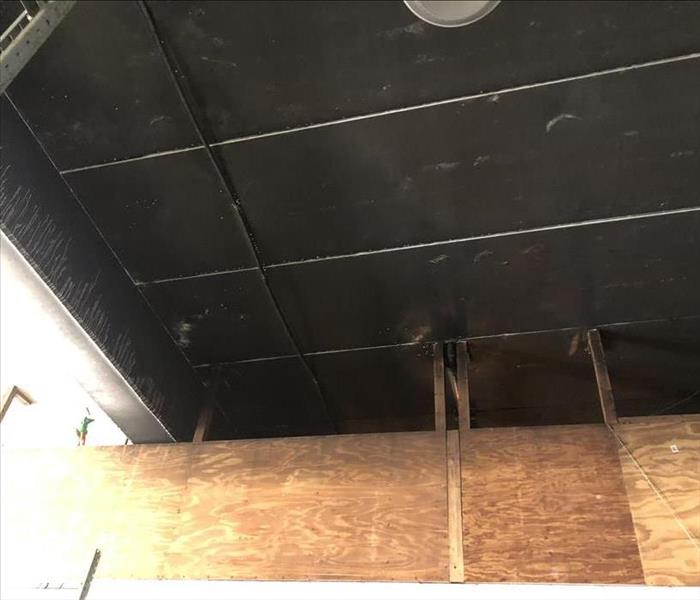 Soot covered ceiling.